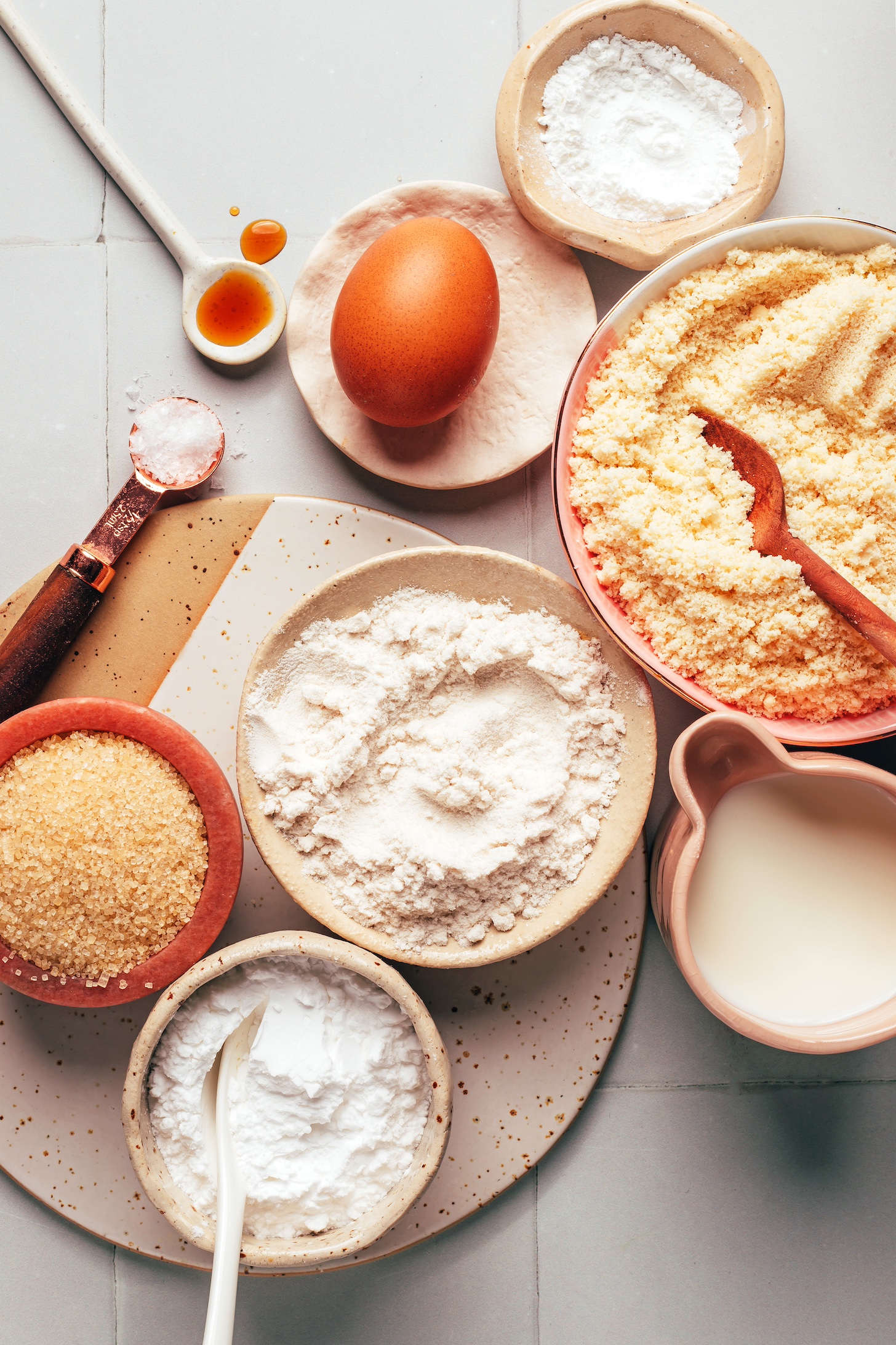 Almond flour, almond milk, brown rice flour, potato starch, cane sugar, salt, vanilla, egg, and baking powder