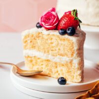 Slice of dairy-free and gluten-free vanilla cake on a plate