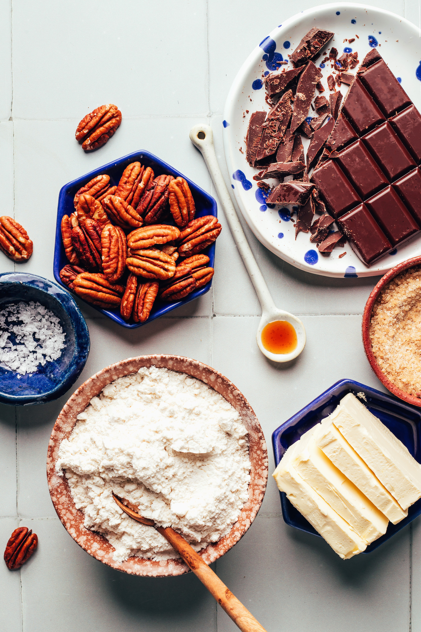 Vegan butter, gluten-free flour blend sea salt, pecans, dark chocolate, vanilla, and cane sugar