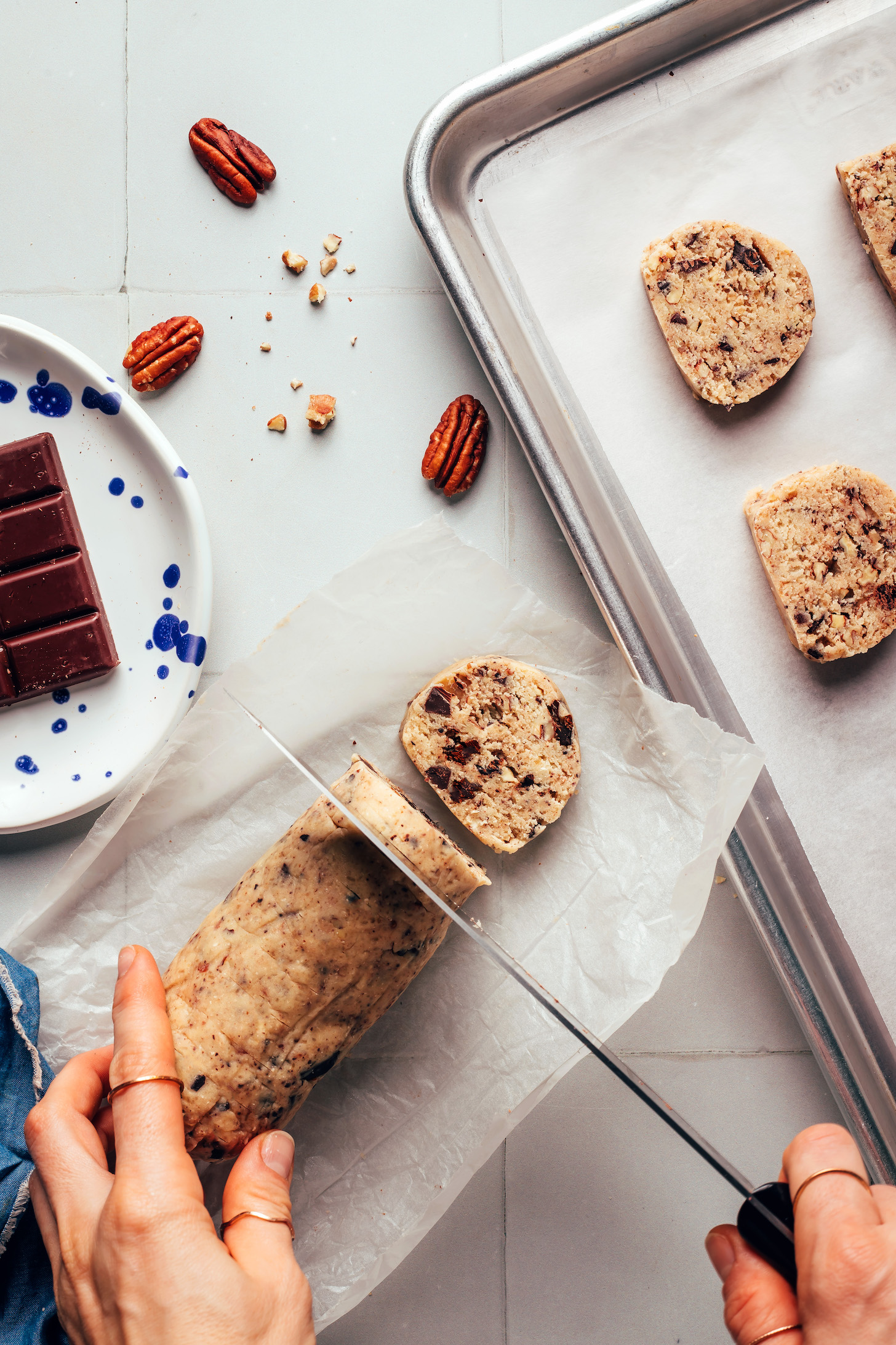 Slicing a log of shortbread cookie dough