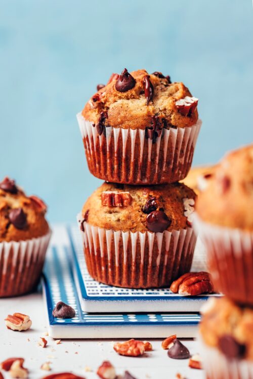 Stack of two vegan gluten-free banana chocolate chip nut muffins