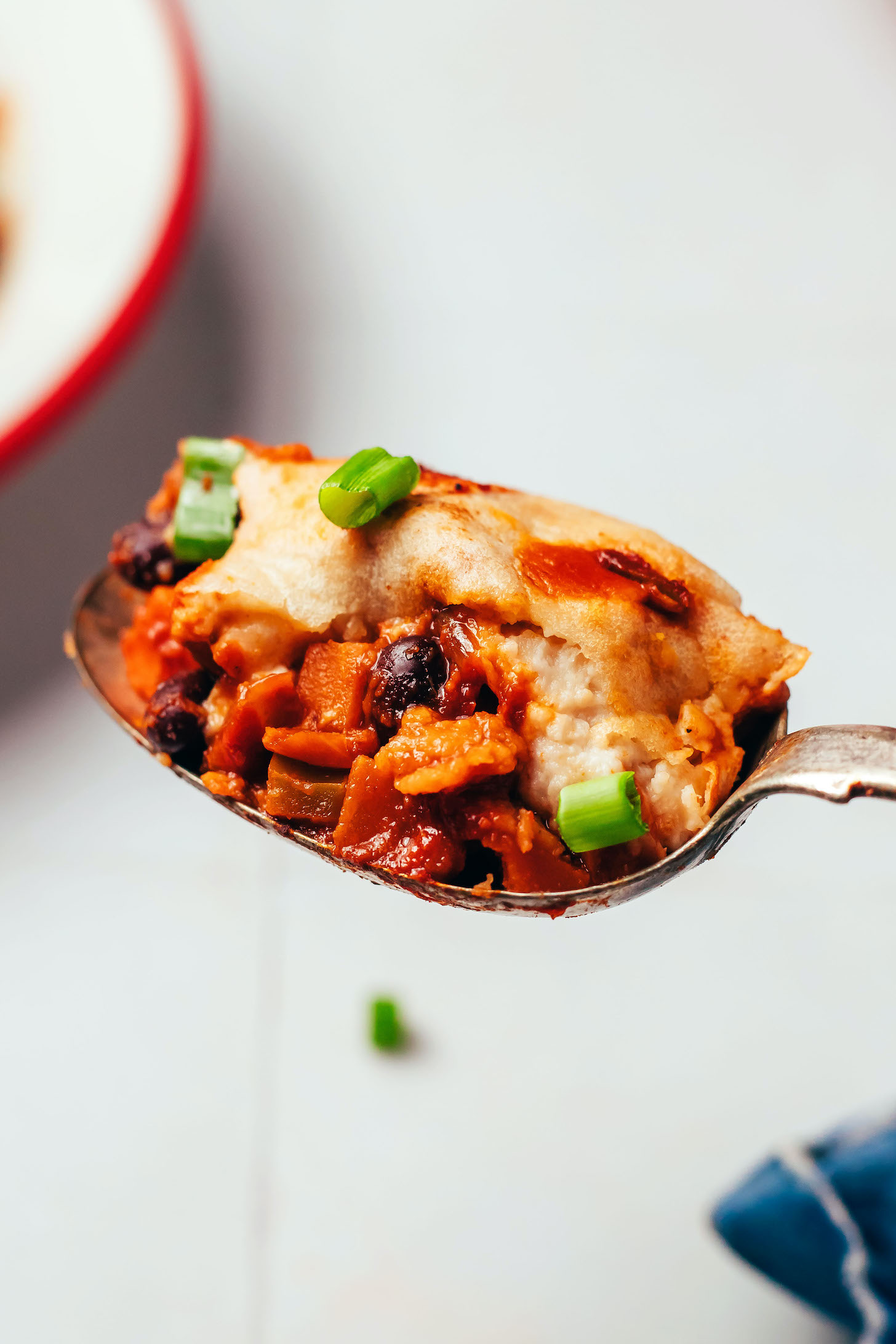 Spoonful of our cheesy vegan enchilada skillet